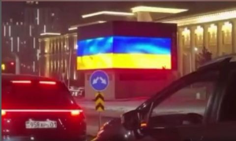 Флаг Украины во время визита Путина в Астану: кибератака была из за рубежа