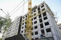 После падения облицовки дома в Казахстане усилят ответственность стройкомпаний